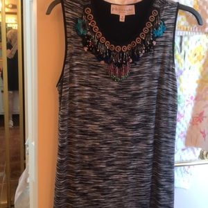 Beautiful embellished dress. No necklace needed